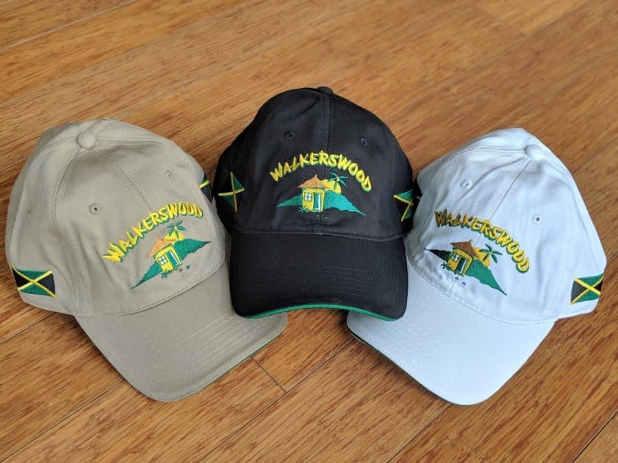 Three hats with the word jamaica on them.