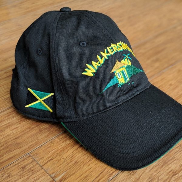 A black hat with the word jamaica on it.