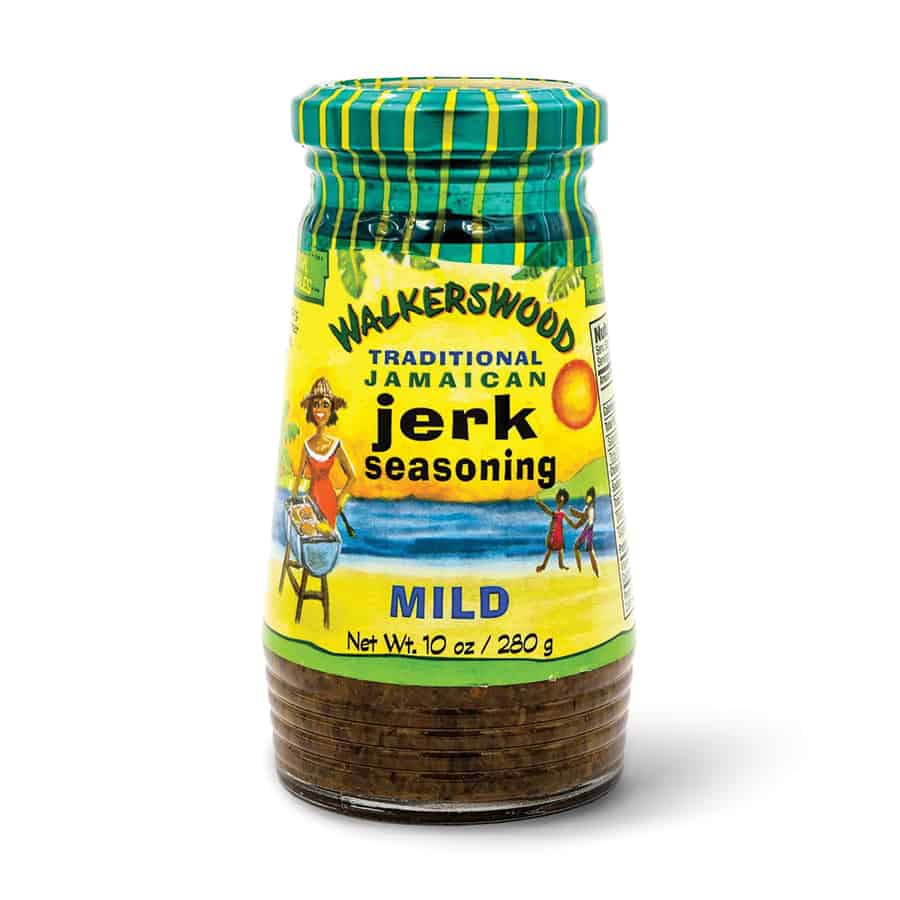A jar of Walkerswood "Mild" Jerk Seasoning on a white background.