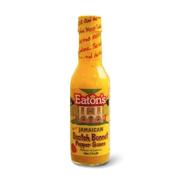 A bottle of Eaton's Jamaican Scotch Bonnet Pepper Sauce 148ml on a white background.
